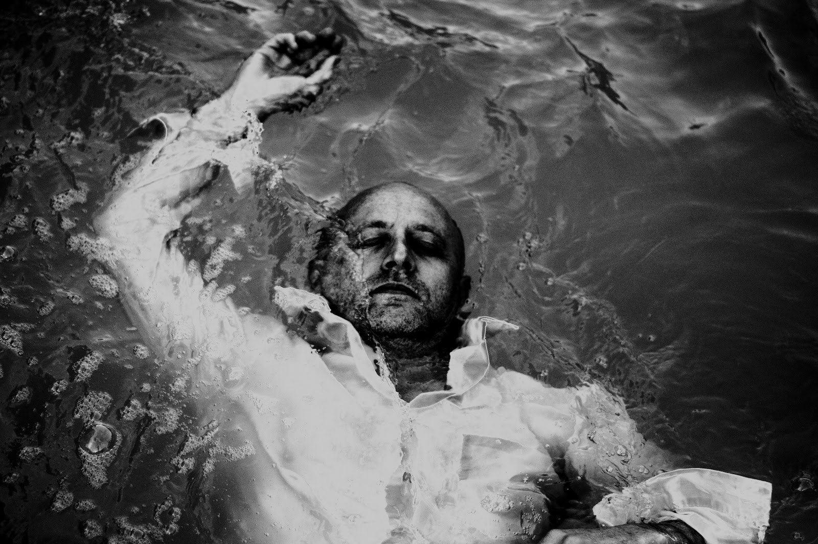 Float, black and white staged photograph